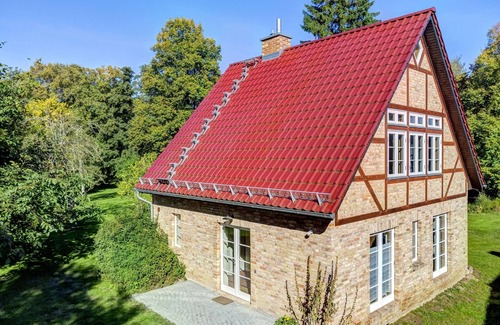 Lassan House | House in the middle of the garden by the swan pond