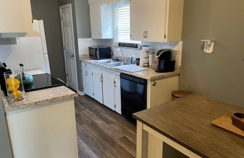 Conway House | House with fenced-in backyard near educational & medical institutions in Conway.