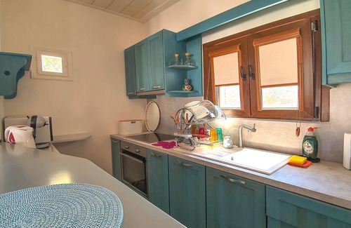 Galissas Apartment | House with friendly atmosphere and sea and sun set view close to a sundy beach
