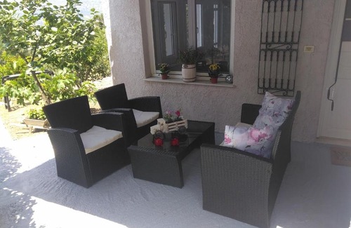 Samos House | House with fruit trees, olive trees, and sea view.