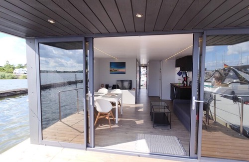 Schleswig Boat Rental | Houseboat Fjord Aries with roof terrace in Schleswig
