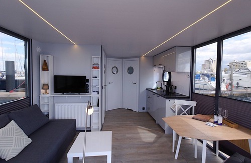 Wendtorf Boat Rental | Houseboat Fjord Auriga with bio sauna and roof terrace in Wendtorf/Kiel Fjord