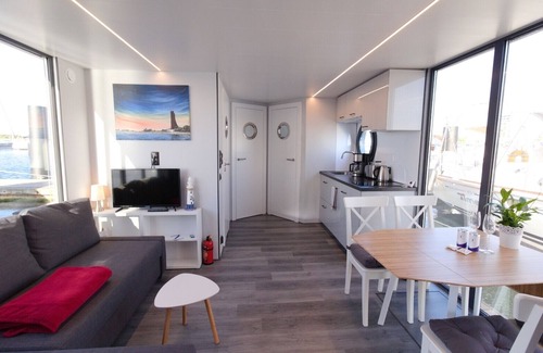 Wendtorf Boat Rental | Houseboat Fjord Lacerta with roof terrace in Wendtorf