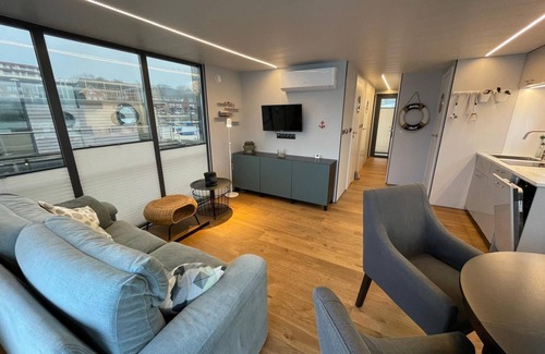 Murwik Boat Rental | Houseboat Fjord Moby Dick with roof terrace in Flensburg