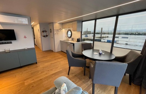 Murwik Boat Rental | Houseboat Fjord Moby Dick with roof terrace in Flensburg