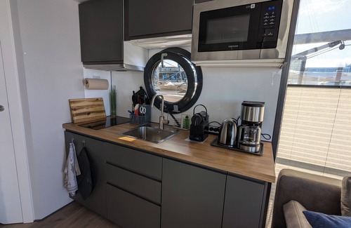 Wendtorf Boat Rental | Houseboat Fjord Stella with bio sauna and roof terrace in Wendtorf/Kiel Fjord