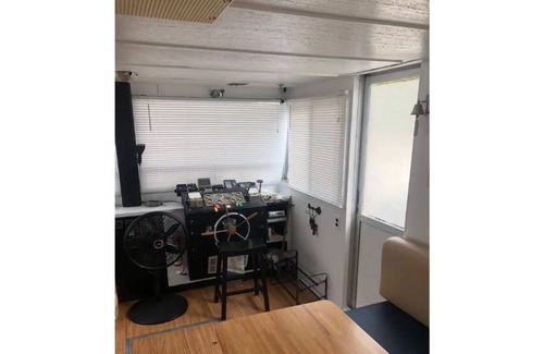 Douglas Boat Rental | Houseboat Getaway - Stay aboard Into the Blue!