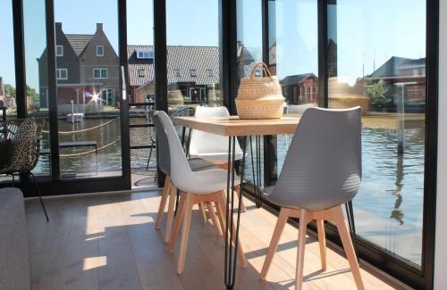 Stavoren Boat Rental | Houseboat in Stavoren with Waterfront Views, cleaning included