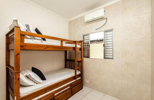 Quietude Apartment | HP4 - Casa em Condomínio com Ar Condicionado, Wi Fi 250Mb e 1Vg Estacionamento Grátis