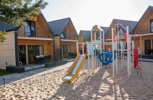 Ustka Ski Chalet | Huśtawka i Hamak - Domki z basenem nad morzem Ustka