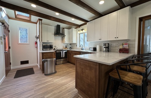 Bushkill House | Huge 3000sqf Creek Front - 8 person hot tub, Fire pit, two decks, Ski Hill.