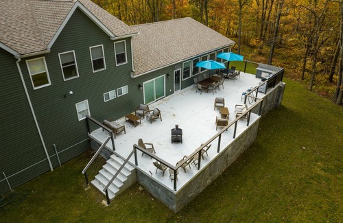 East Stroudsburg House | Huge Home in the Poconos w/Indoor Pool, Game Room, Movie Theater and Much More!