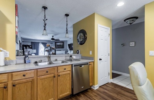 Mount Mourne House | Hummingbird Manor - Relax in Hot Tub in Private Backyard with fire pit area