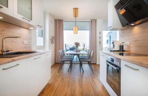Marienleuchte Apartment | Hygge – Familienfreundliche Ferienwohnung mit Garten & Meerblick