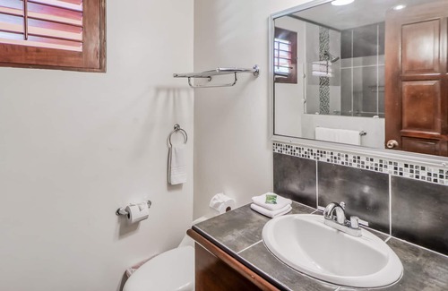 Damas Condo | Ideal Tropical Retreat W/ Private Patio, Shared Pool, Lush Gardens & More!