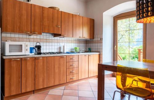 Caldonazzo Apartment | Il Giardino ai Volti 2P, Caldonazzo Ospitar