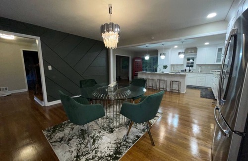 Southwestern House | Immerse yourself in this renovated, 4 bedroom,3 bath gated home!