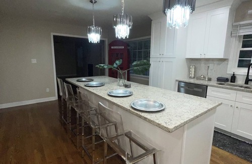 Southwestern House | Immerse yourself in this renovated, 4 bedroom,3 bath gated home!