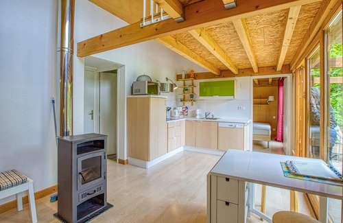Mirandol-Bourgnounac House | In idyllic location of a forest and near the river Vaur is this cozy wooden house.