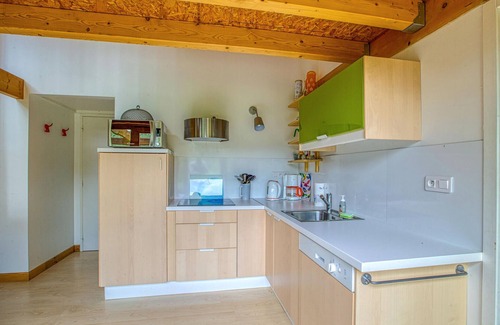 Mirandol-Bourgnounac House | In idyllic location of a forest and near the river Vaur is this cozy wooden house.