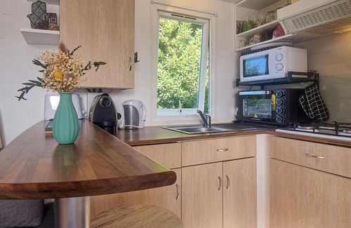 Saint Laurent de la Pree House | In this mobile home not far from the beach your vacation will be a pleasure.