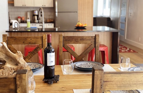 Ennis House | In Town Beautiful Private Getaway, Gym and Hot Tub, Walk to Downtown