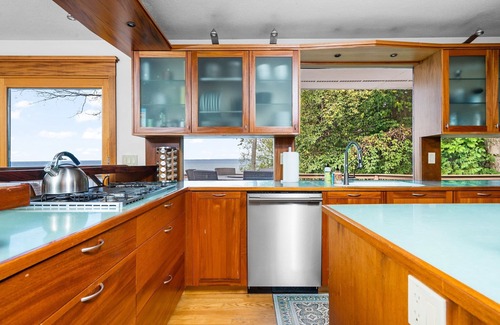 Suttons Bay House | Incredible Mid-Century Modern Waterfront Home on West Bay, on M22 - Sleeps 12