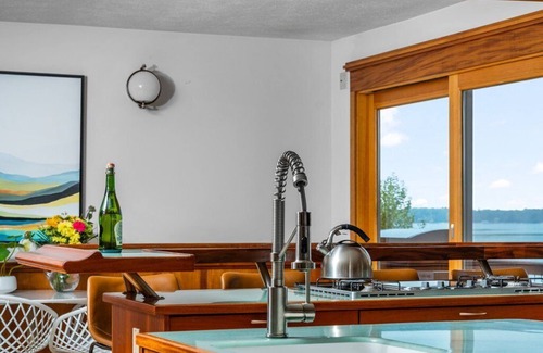 Suttons Bay House | Incredible Mid-Century Modern Waterfront Home on West Bay, on M22 - Sleeps 12