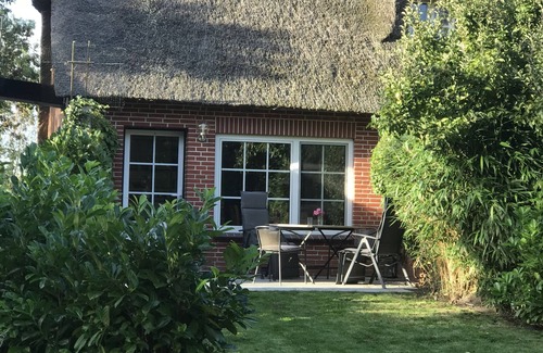 Osterhever House | Individual maisonette apartment with garden and terrace