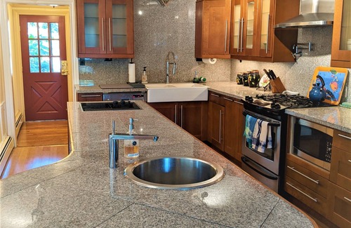 Eastport House | Indoor/Outdoor waterfront oasis with indoor heated pool awaits you in Eastport!