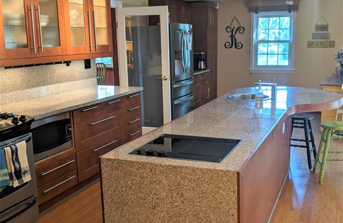 Eastport House | Indoor/Outdoor waterfront oasis with indoor heated pool awaits you in Eastport!