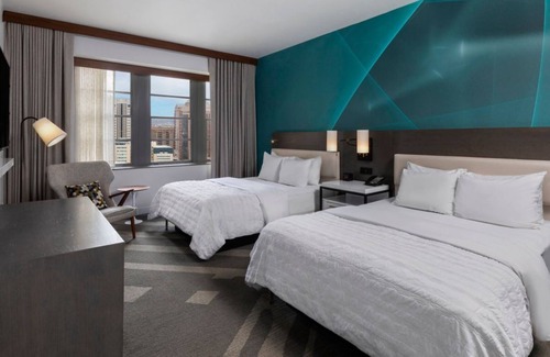 Downtown Houston Hotel | Indulge in Comfort & Style! 4 Spacious Units for Groups, Pets Allowed!