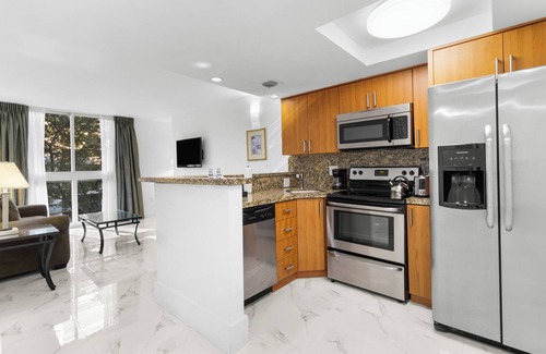 Coconut Grove Hotel | Indulge in Home Like Comfort! 4 Comfortable Units, Onsite Pool, Kitchen
