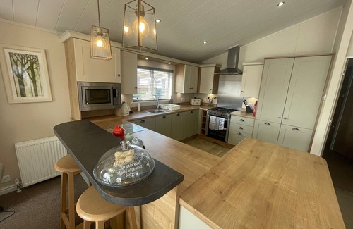 Tattershall Cabin | Indulgence Lakeside Lodge i1 is prime location with private fishing peg and hot tub at Tattershall