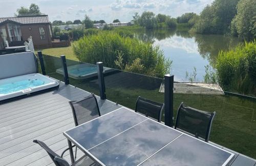 Tattershall House | Indulgence Lakeside Lodge i3 with hot tub, private fishing peg situated at Tattershall Lakes Country Park
