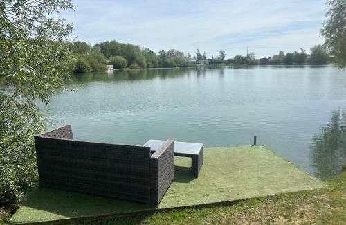 Tattershall House | Indulgence lakeside lodge i1 with hot tub, private fishing peg situated at Tattershall Lakes Country Park