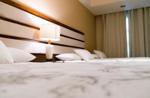 Alfredo V. Bonfil Apartment | Infinity Suites habitación triple