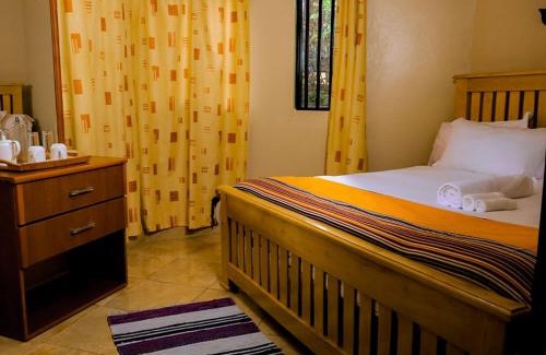 Entebbe Hotel | Inn the Woods Entebbe