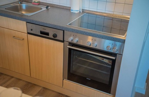Fehmarn Apartment | Inselblume 78 - vacation home with beach chair in Burgtiefe