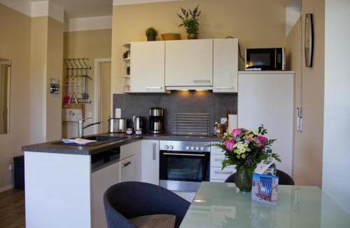 Fehmarn House | Inselblume 48 - Kuschlige Ferienwohnung in der Strandburg