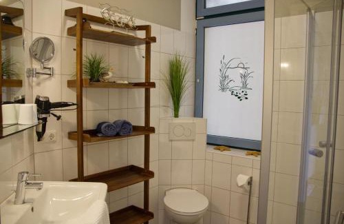 Fehmarn House | Inselblume 48 - Kuschlige Ferienwohnung in der Strandburg