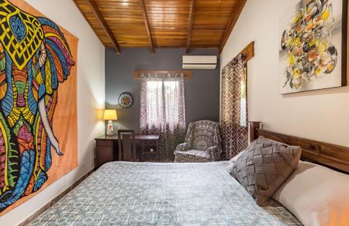 Barrio Las Parcelas House | Intimate Earthy Vibe - Bedroom in a Tropical Paradise