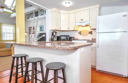 Stone Harbor House | Introducing Stone Court Cottage, a charming vacation rental available for your summer vacation