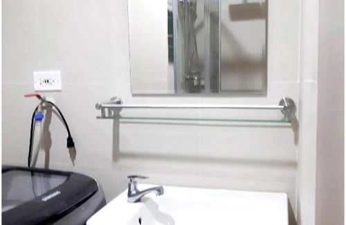 Highway Hills Apartment | Iona Reign's Vacation Unit at FAME Residences