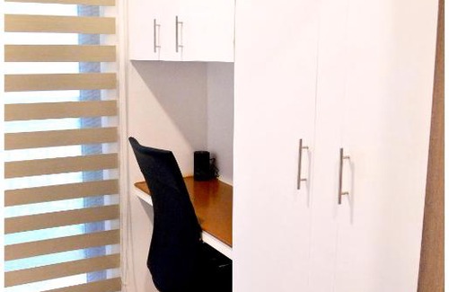 Highway Hills Apartment | Iona Reign's Vacation Unit at FAME Residences