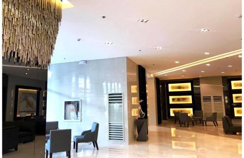 Highway Hills Apartment | Iona Reign's Vacation Unit at FAME Residences