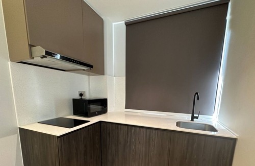 Marine Parade House | ISA hotel apartments Queens /King Room with kitchen & washer-dryer attached