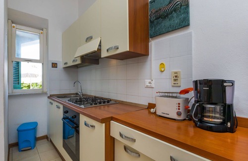 Castiglioncello Apartment | Lovely apartment for 4 guests with patio and parking
