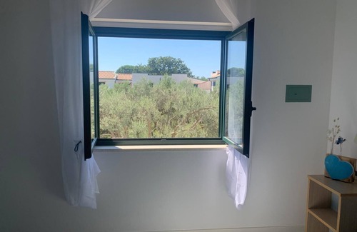 Sant'Andrea Apostolo dello Ionio House | Holiday Home 'Casa Del Sole' with Private Terrace and Air Conditioning