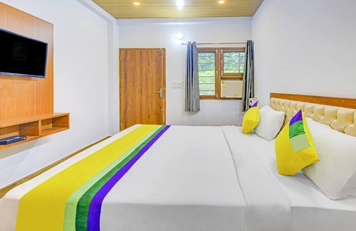 Bullawala Hotel | Itsy By Treebo - Studioz @ Om River Resort